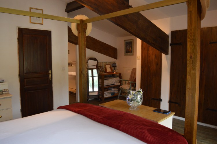 Master bedroom with view into ensuite